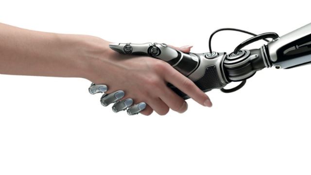 Human shaking hands with a robot