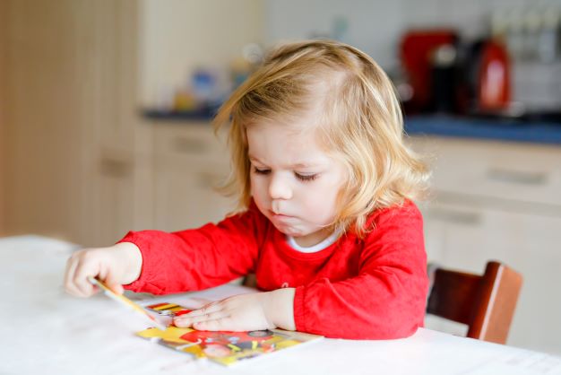 Child doing puzzle