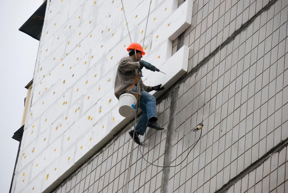 Cladding being installed