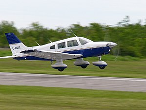 Piper light aircraft coming into land 