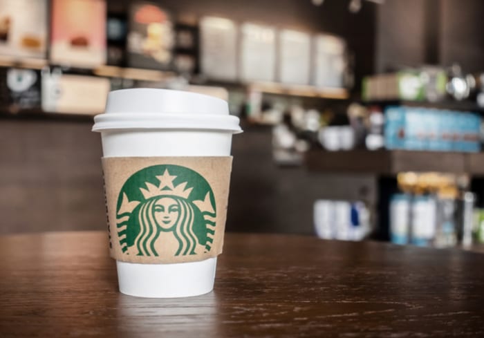 Starbucks coffee cup on the table