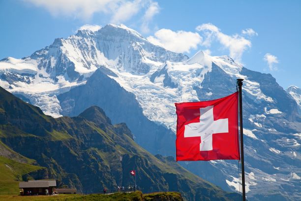 Image of mountains and Swiss flag