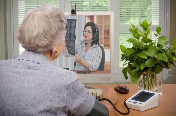 Patient receiving remote consultation